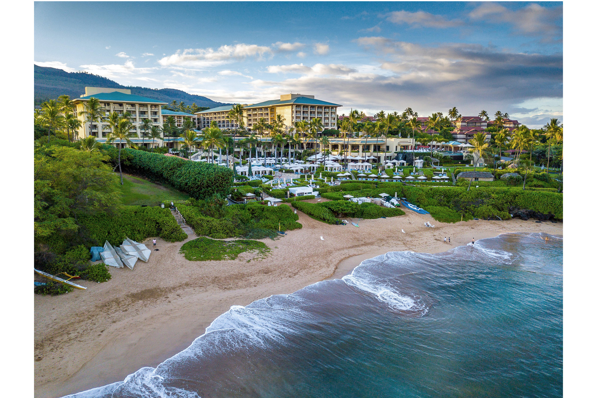 Four Seasons Resort Maui at Wailea with the sea lapping onto the shore
