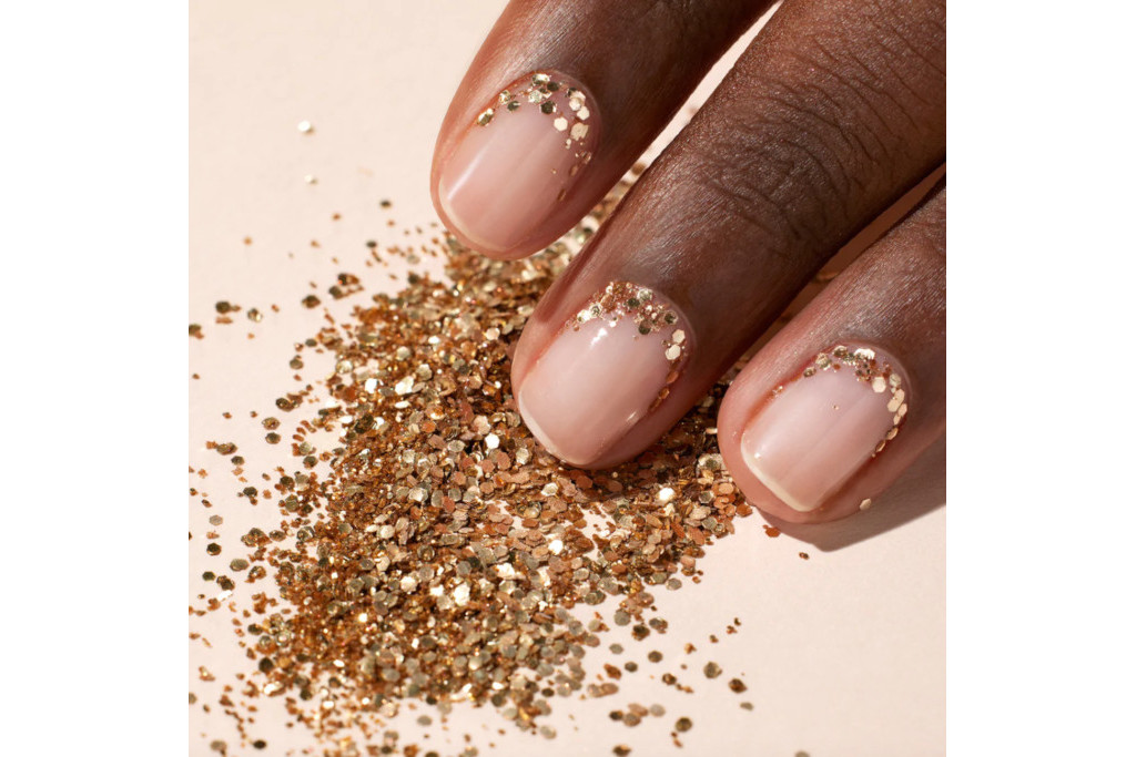 Close up of hand with glitter