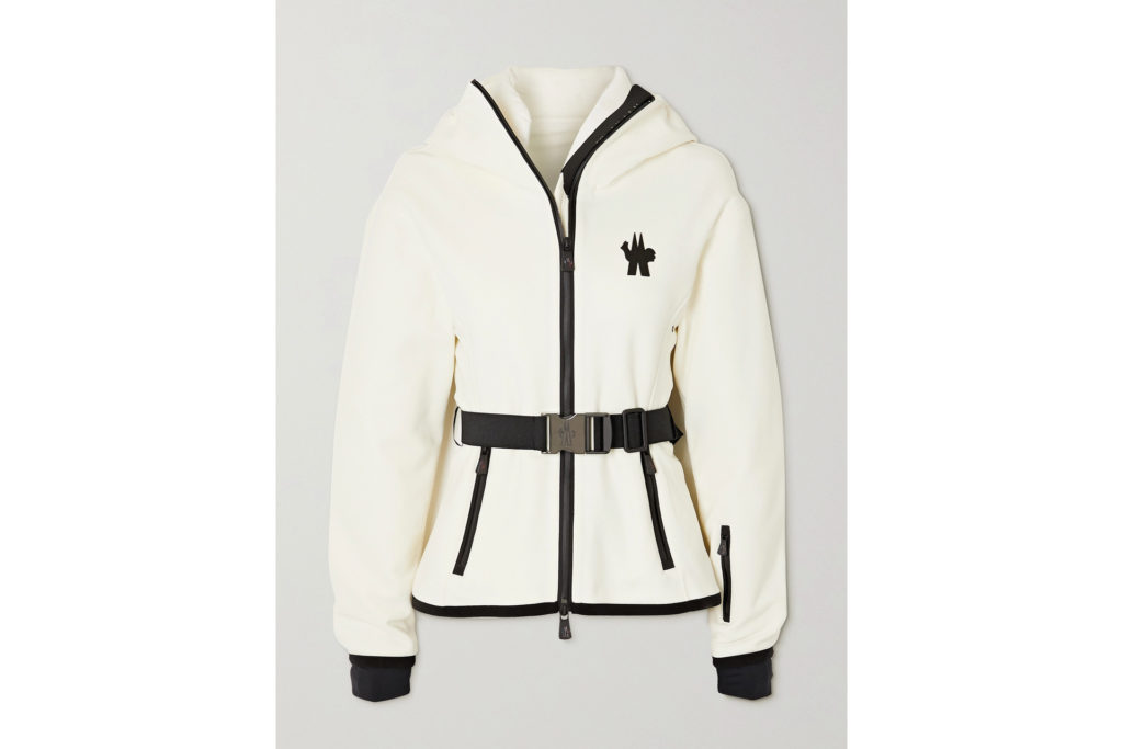 a cream and black ski jacket