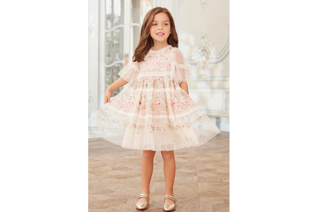 Girl in pink floral dress