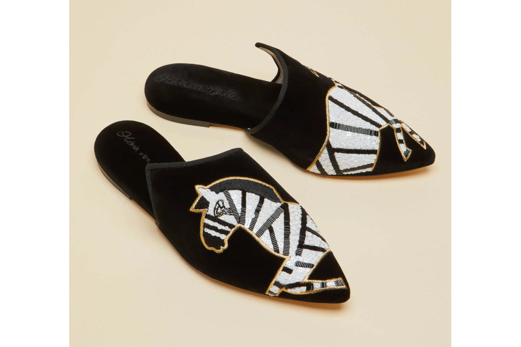 Black slippers with zebras on the toes