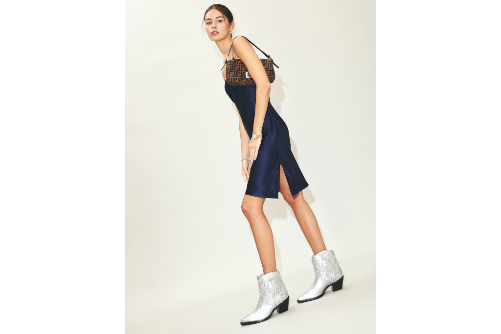 Woman in blue dress with silver boots