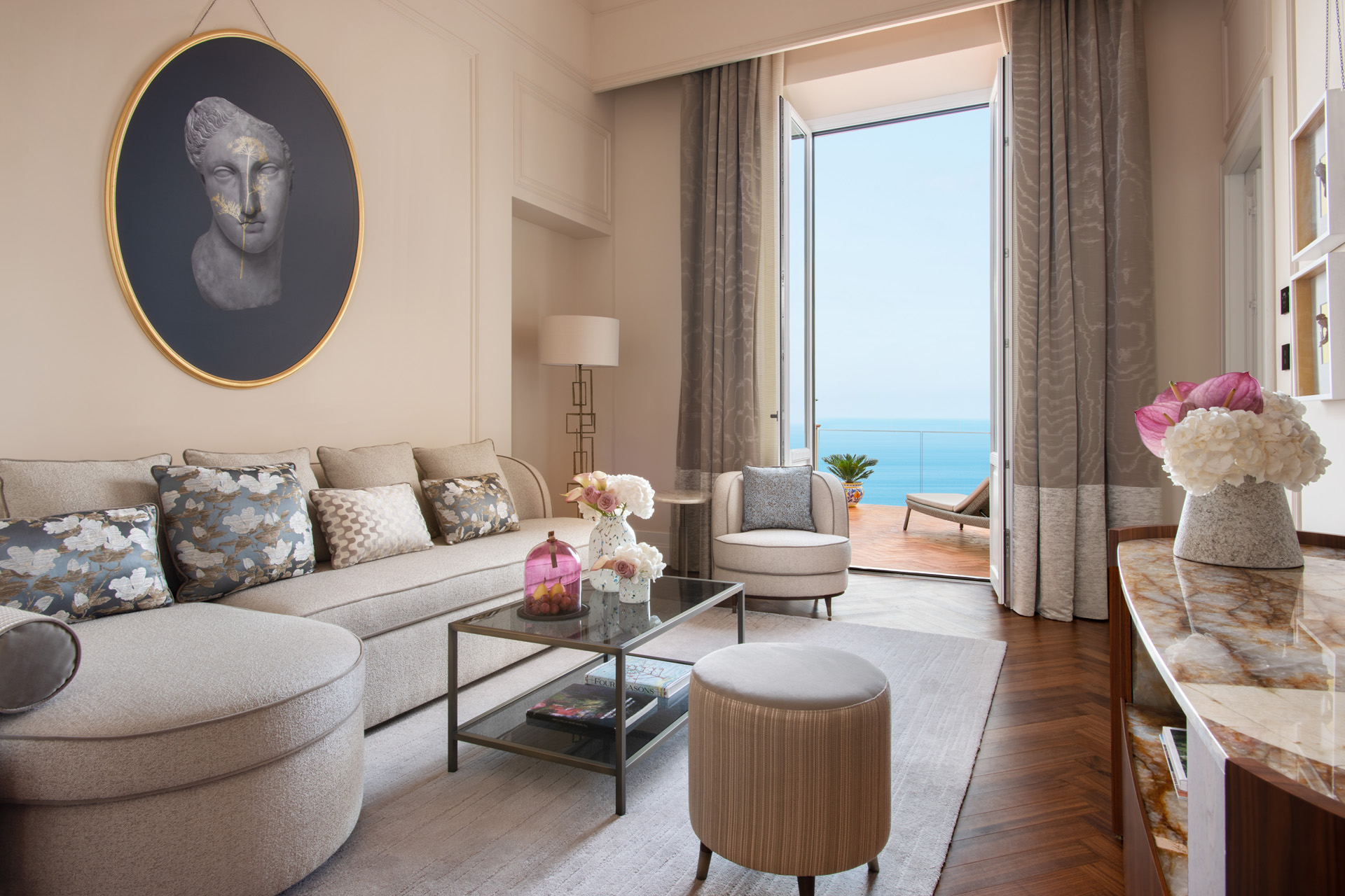 a suite living room overlooking the sea