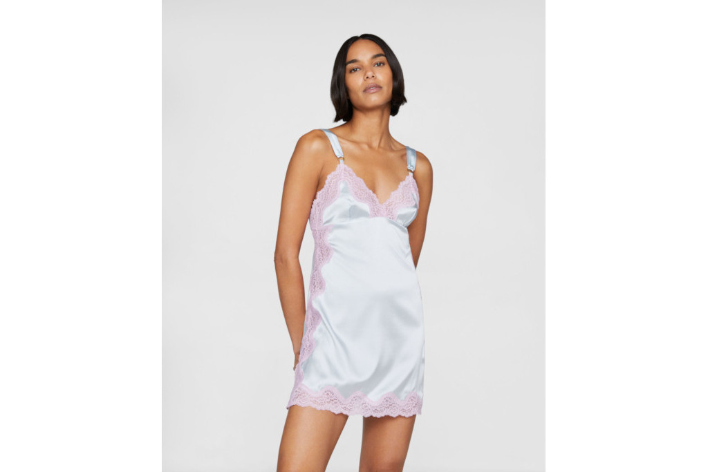 Woman in light blue silk chemise