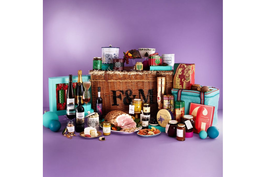 Christmas hamper on purple background