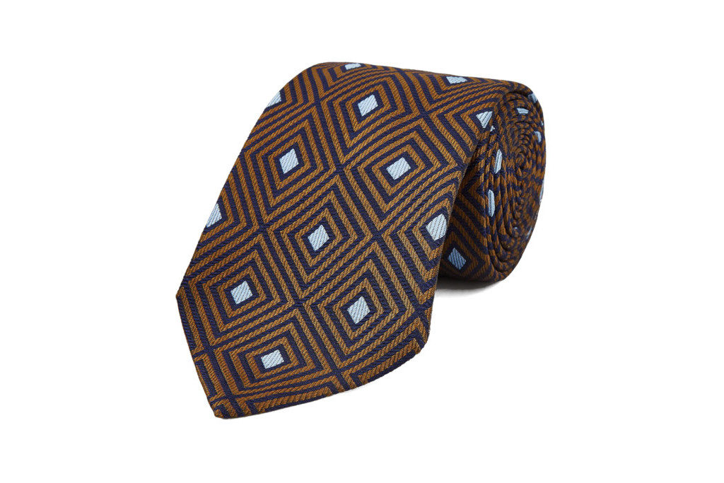 Brown tie with square pattern