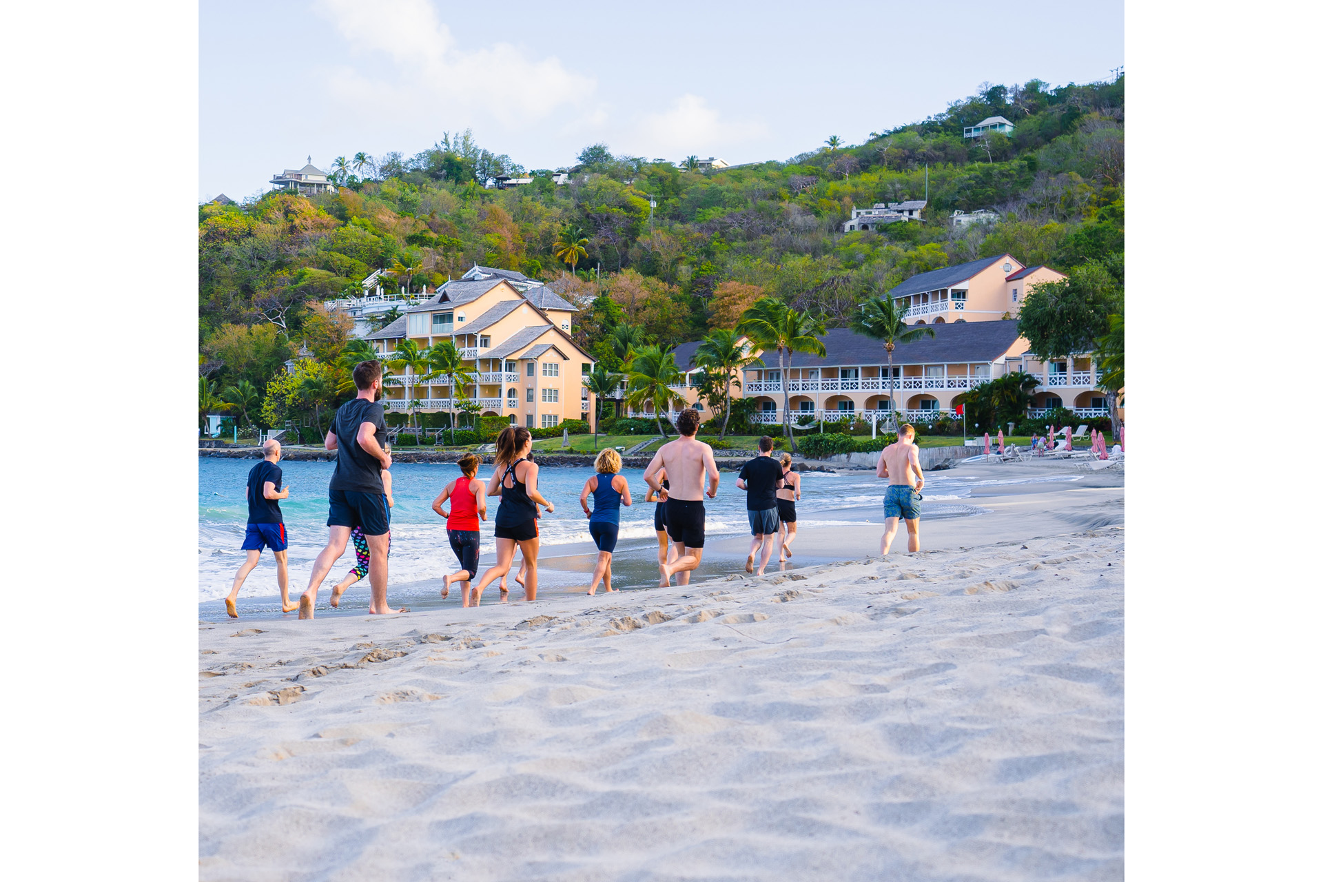 people running on the beach