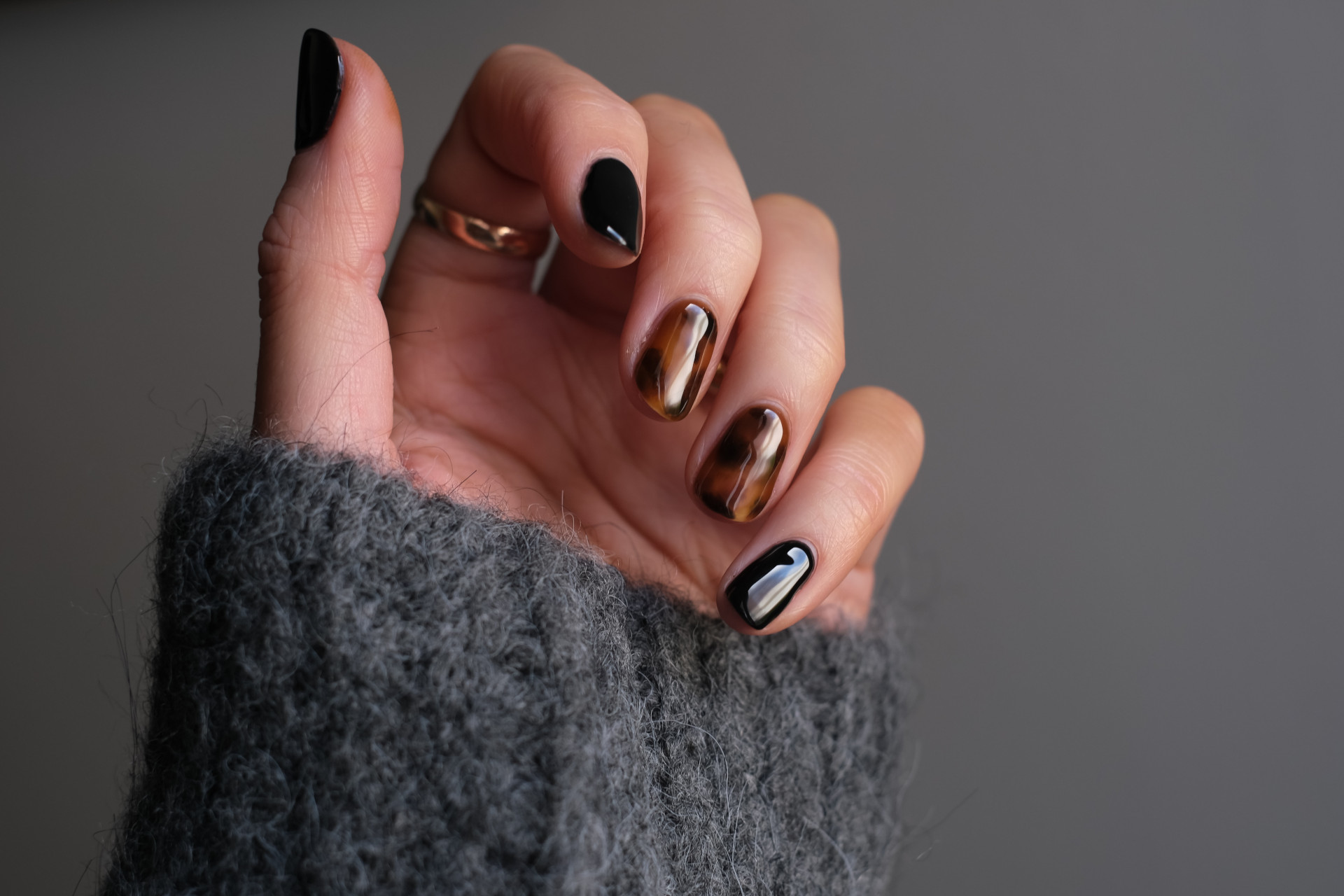 Close up of hand with nail varnish painted on