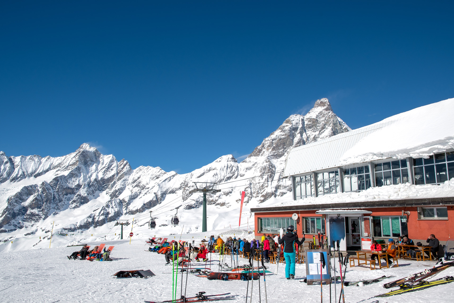 Breuil-Cervinia ski resort and Monte Cervino with a ski lodge in the foreground