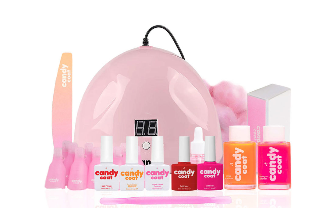 Gel nail polish kit with pink LED drying lamp