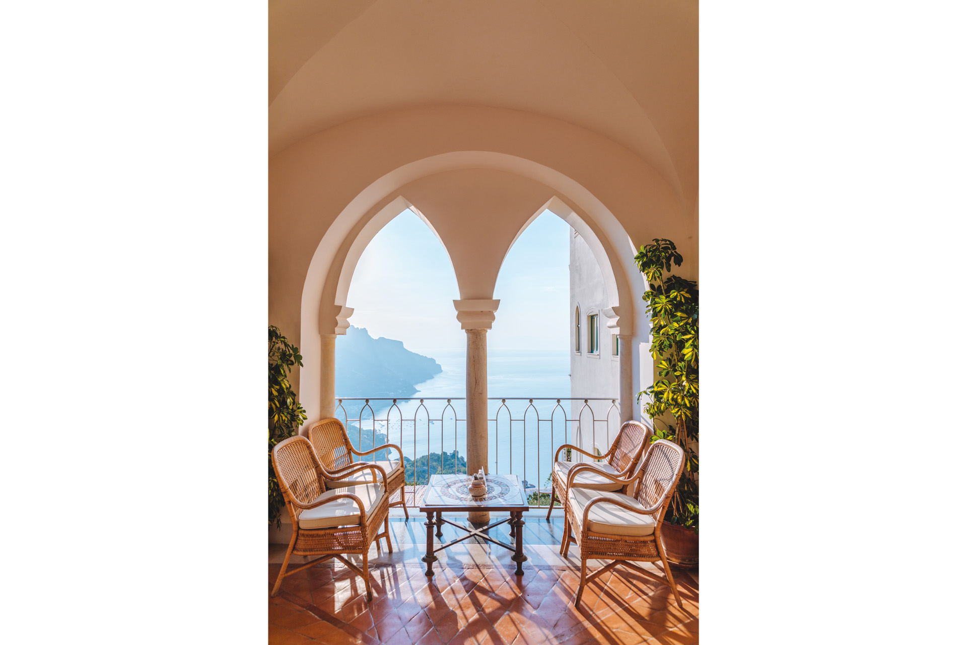 wicker chairs overlooking the sea at Belmond Caruso