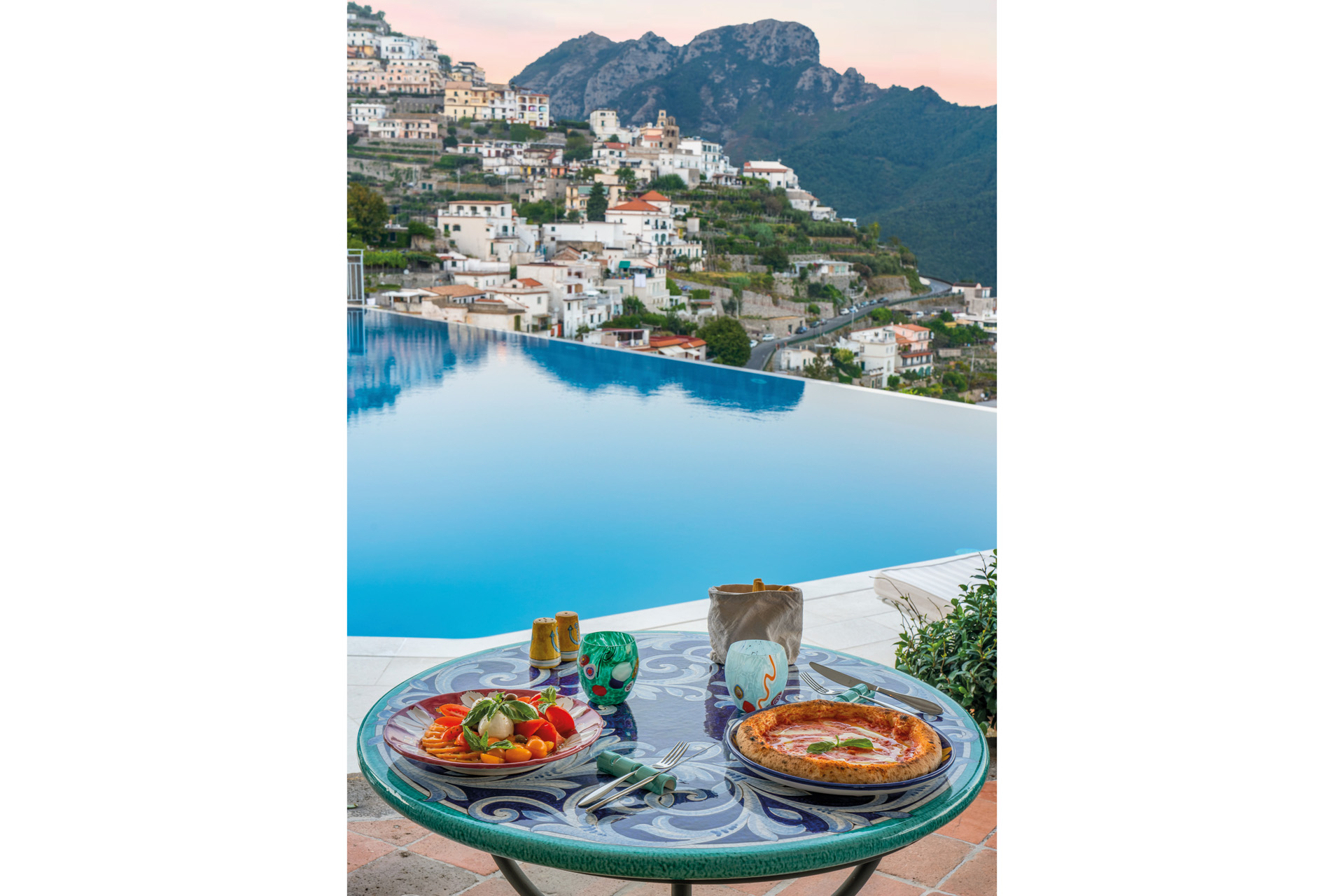 food overlooking the infinity pool at Belmond Caruso