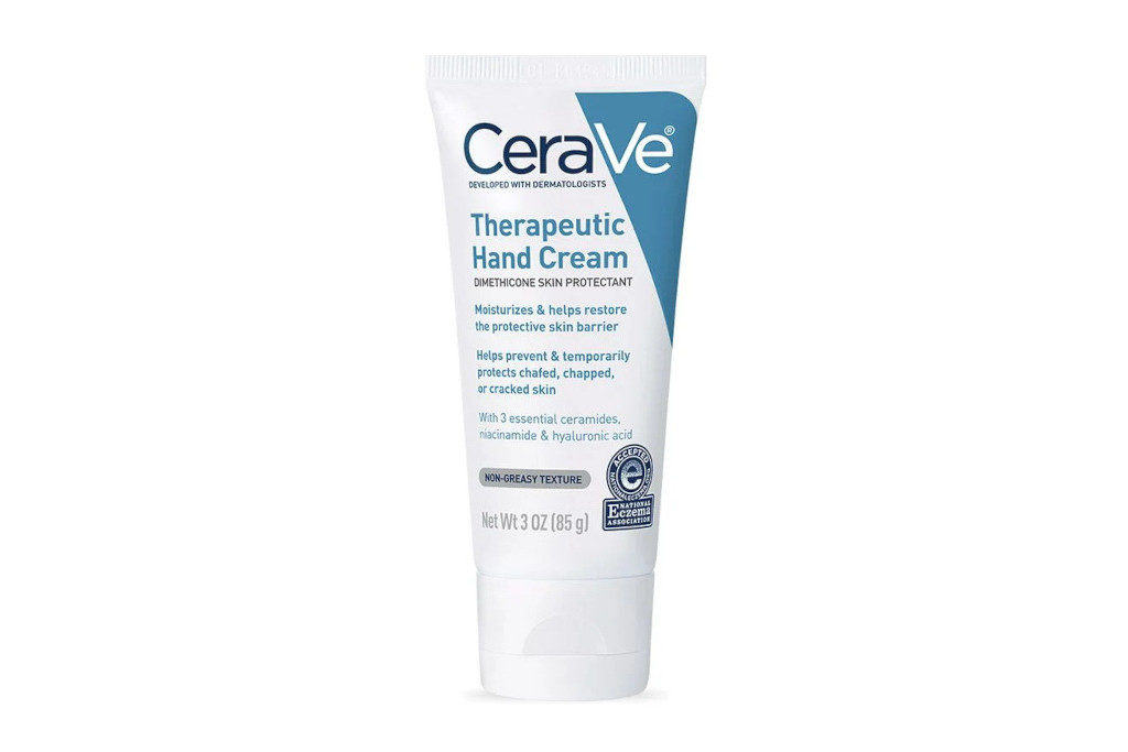 White and blue bottle of hand cream