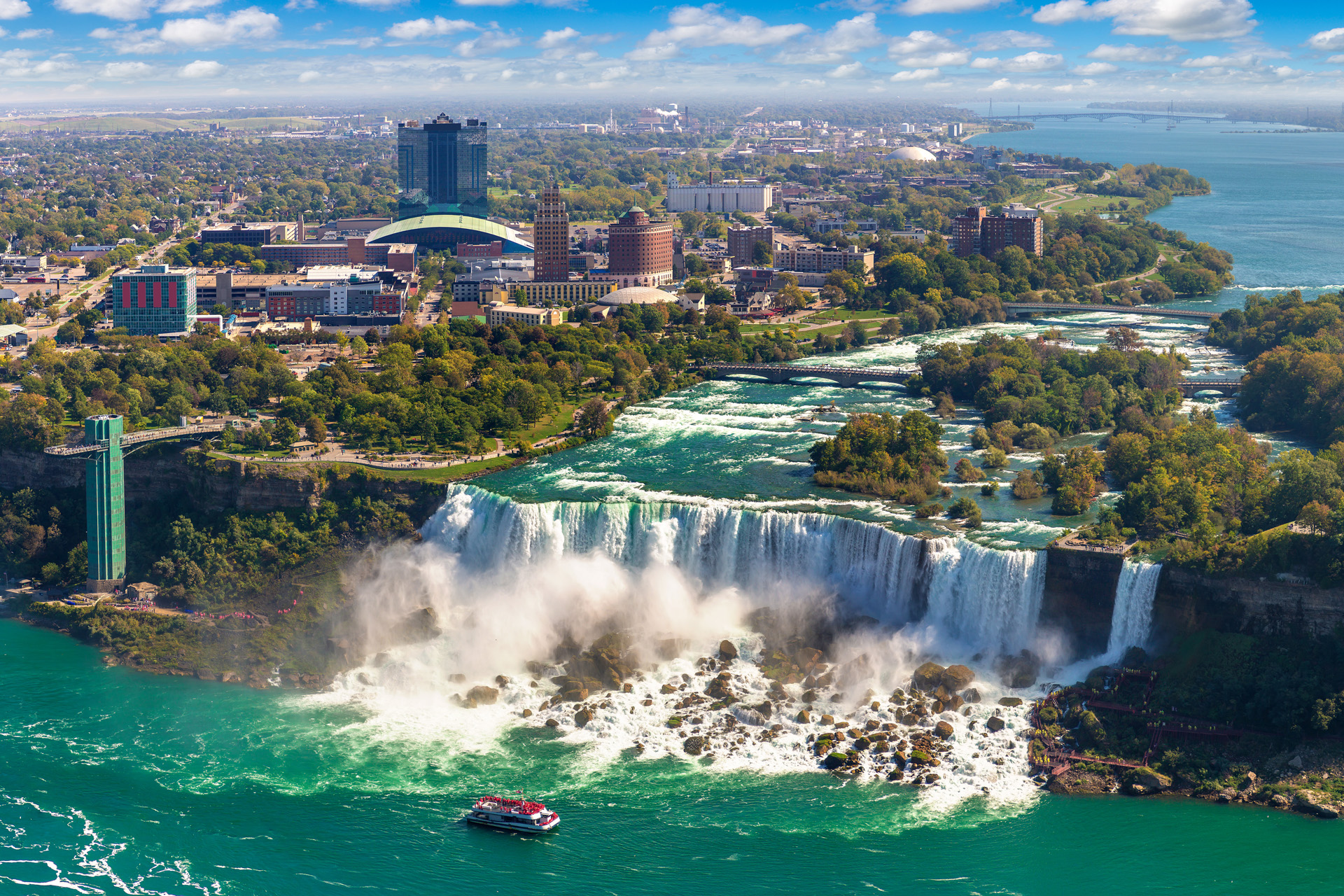 Panorama of aerial view of Canadian side view of Niagara Falls, American Falls and Observation Tower in Niagara Falls, Ontario, Canada