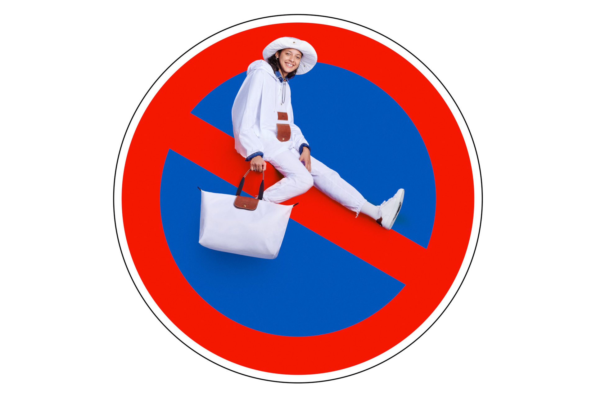 Model in white sat on stop sign