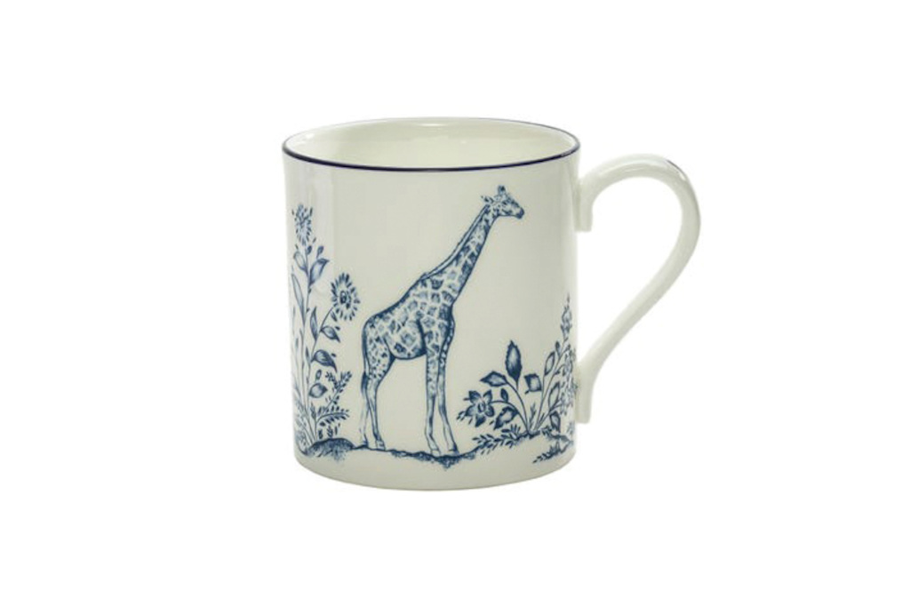White mug with blue giraffe illustration
