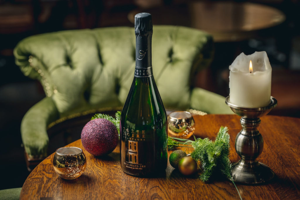 a bottle of champagne on a table