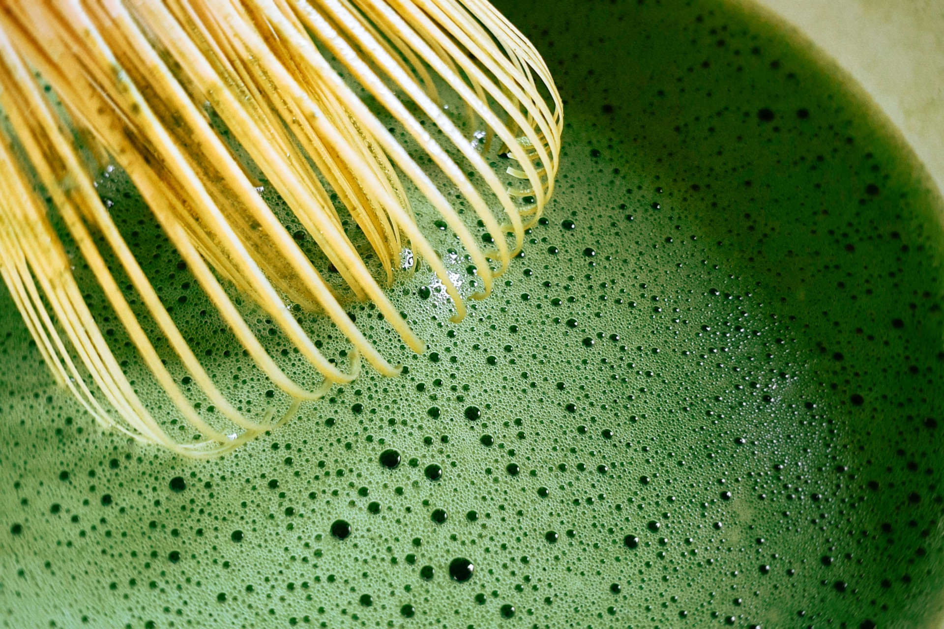 Close up of matcha bring whisked