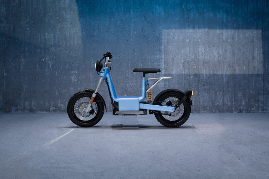 Blue moped in warehouse