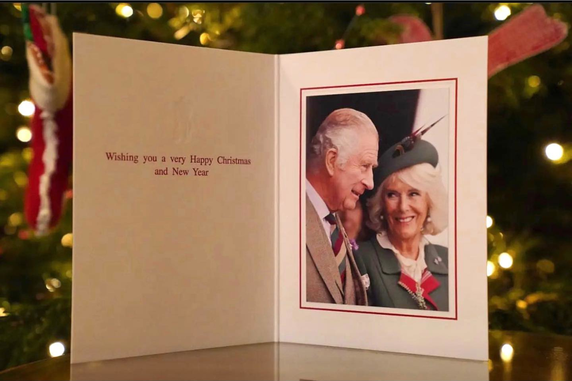 Christmas card with picture of King Charles and Camilla