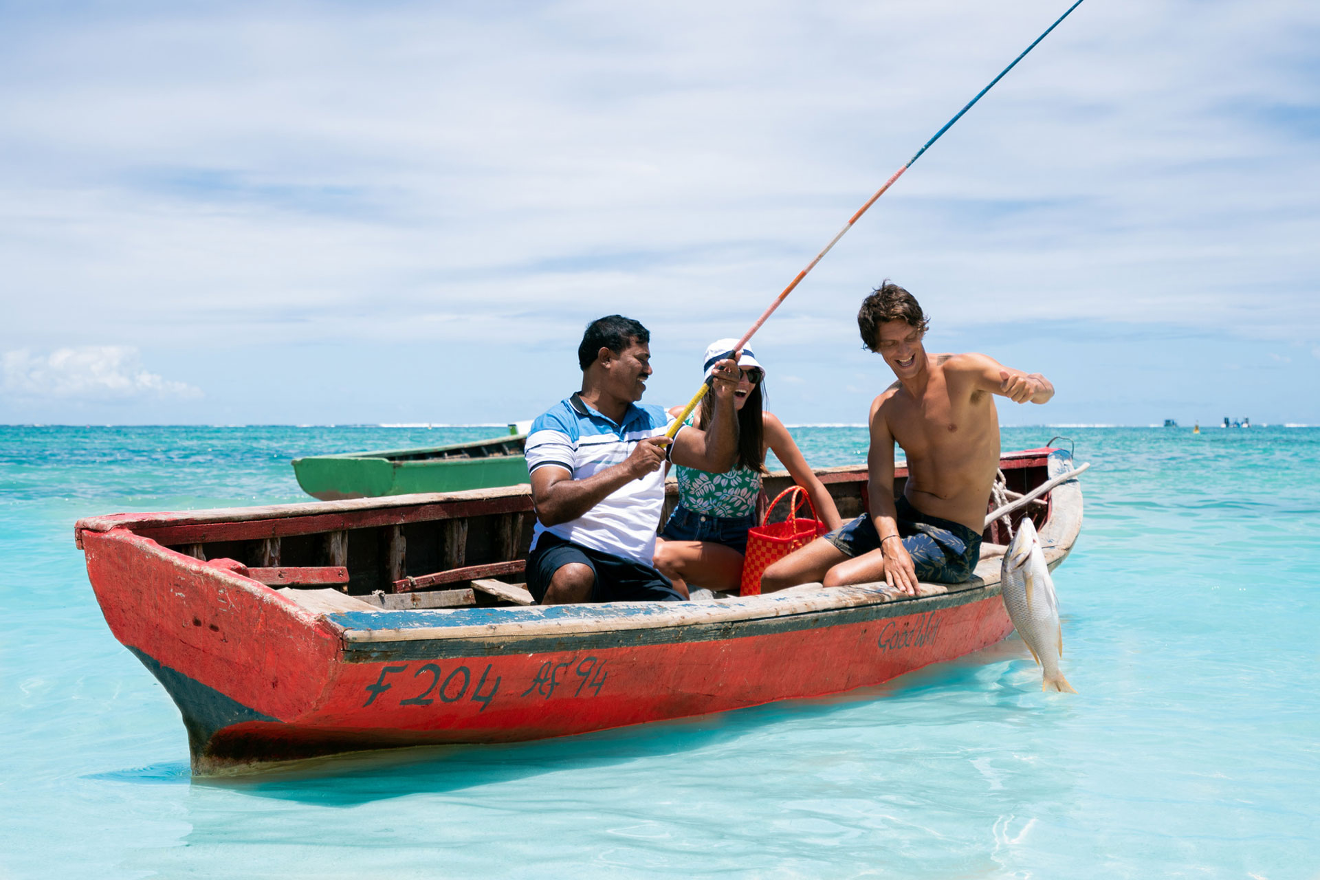 Three people Salt Fishing in the ocean-Mauritius