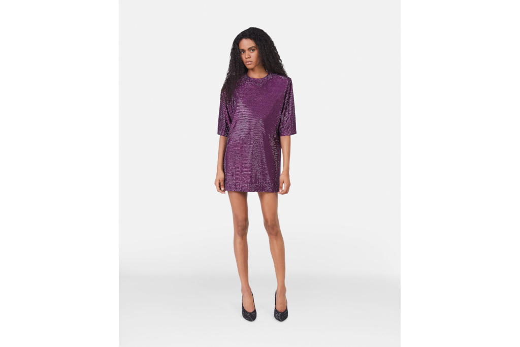 Woman in purple mini dress