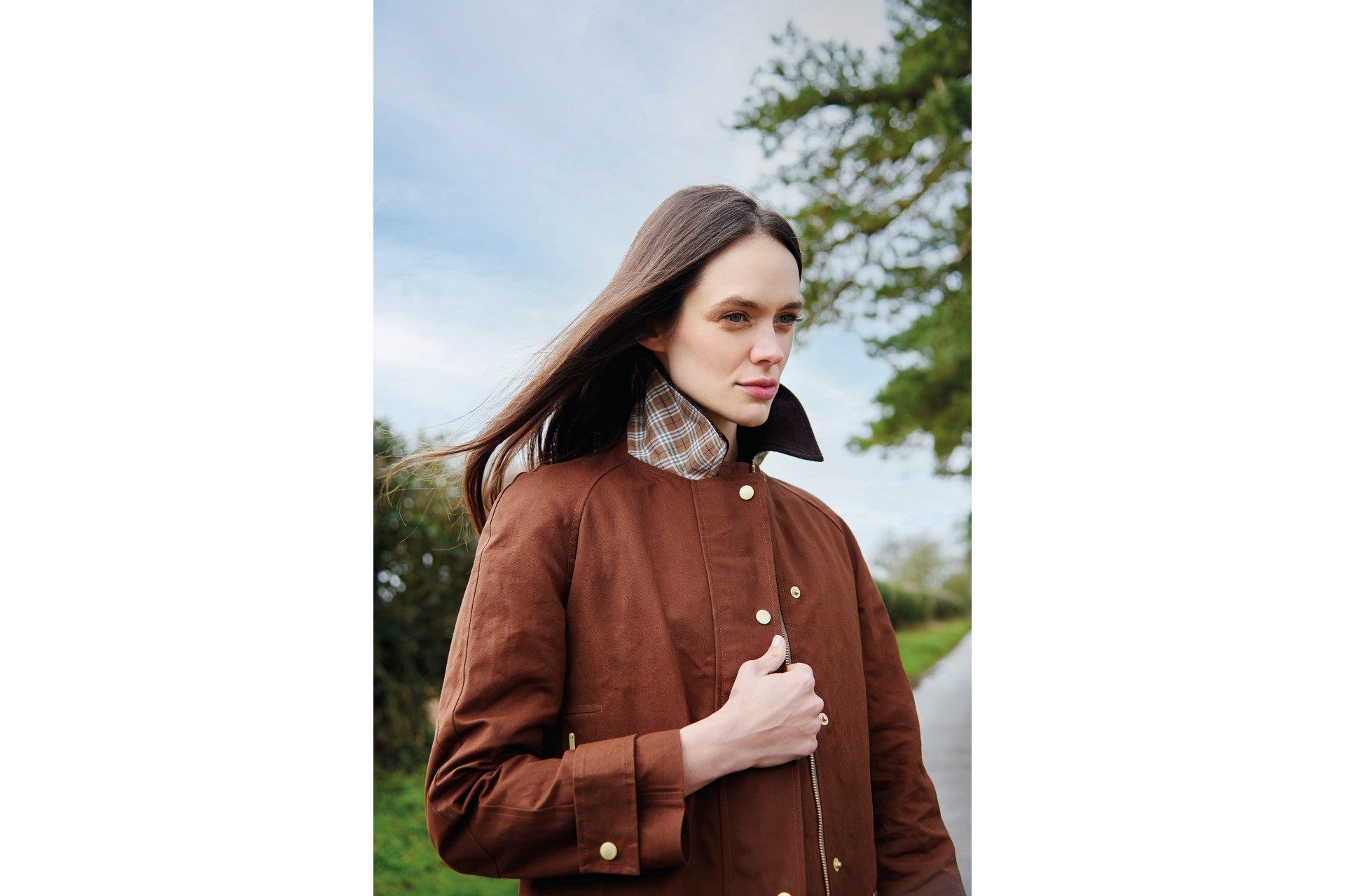 Woman in brown coat