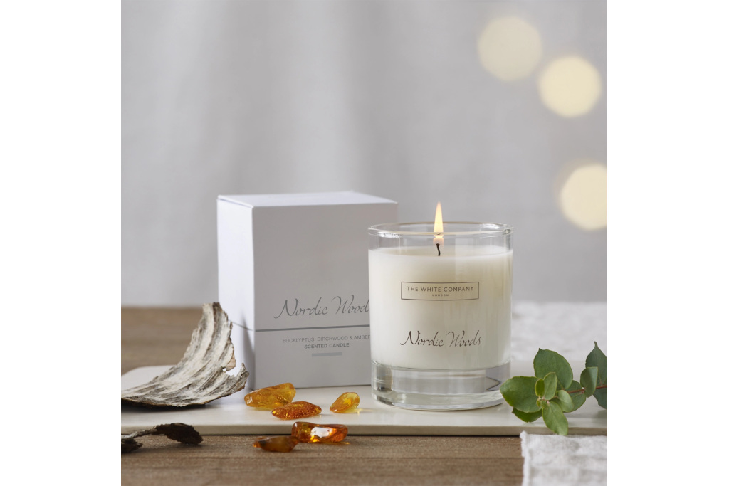 White candle on side table