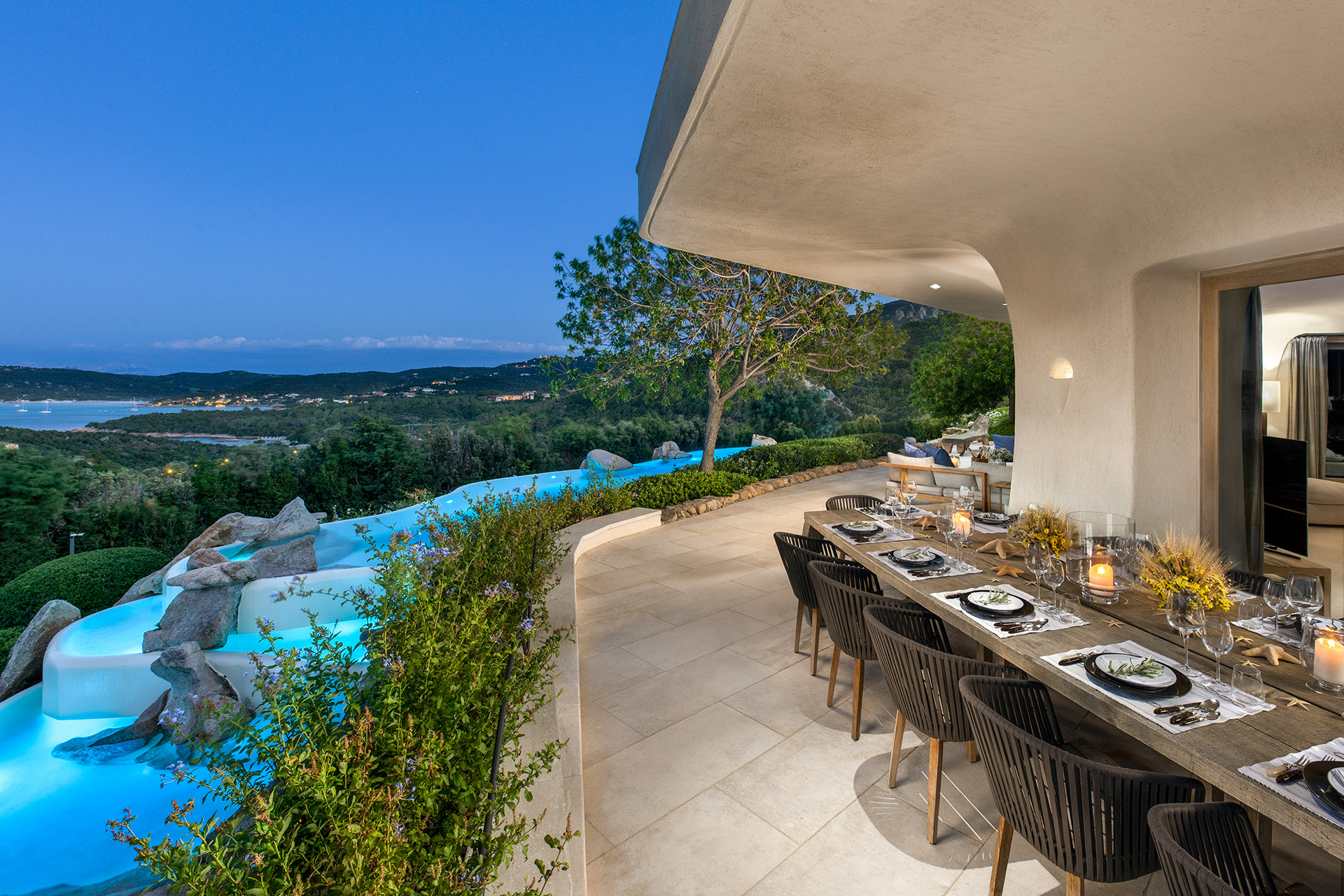 a villa with outdoor dining area in italy