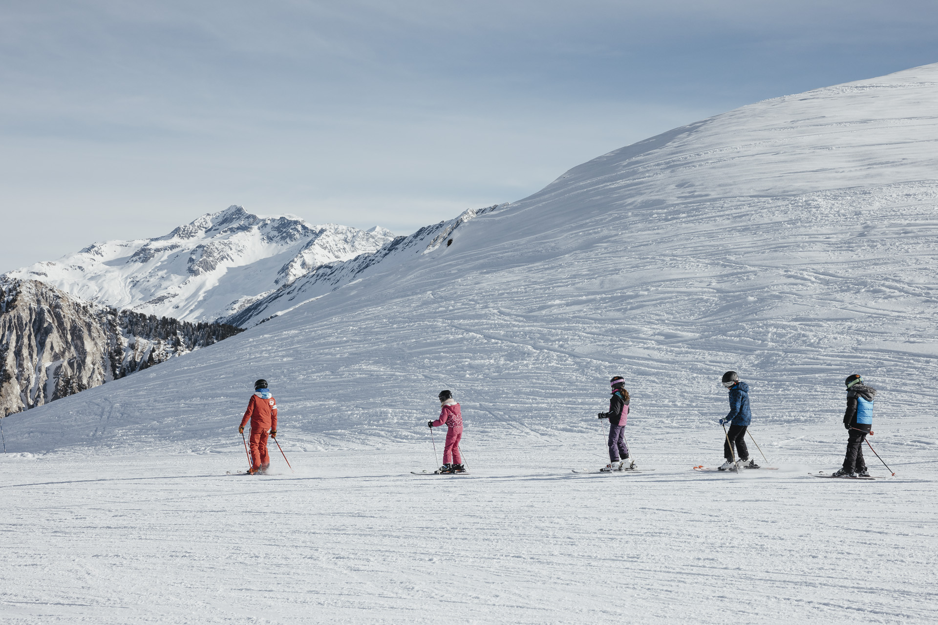 Young skiiers on the snowy mountain