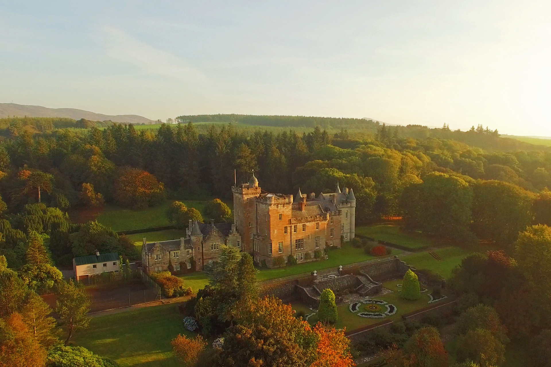 Glenapp Castle at golden hour from a distance