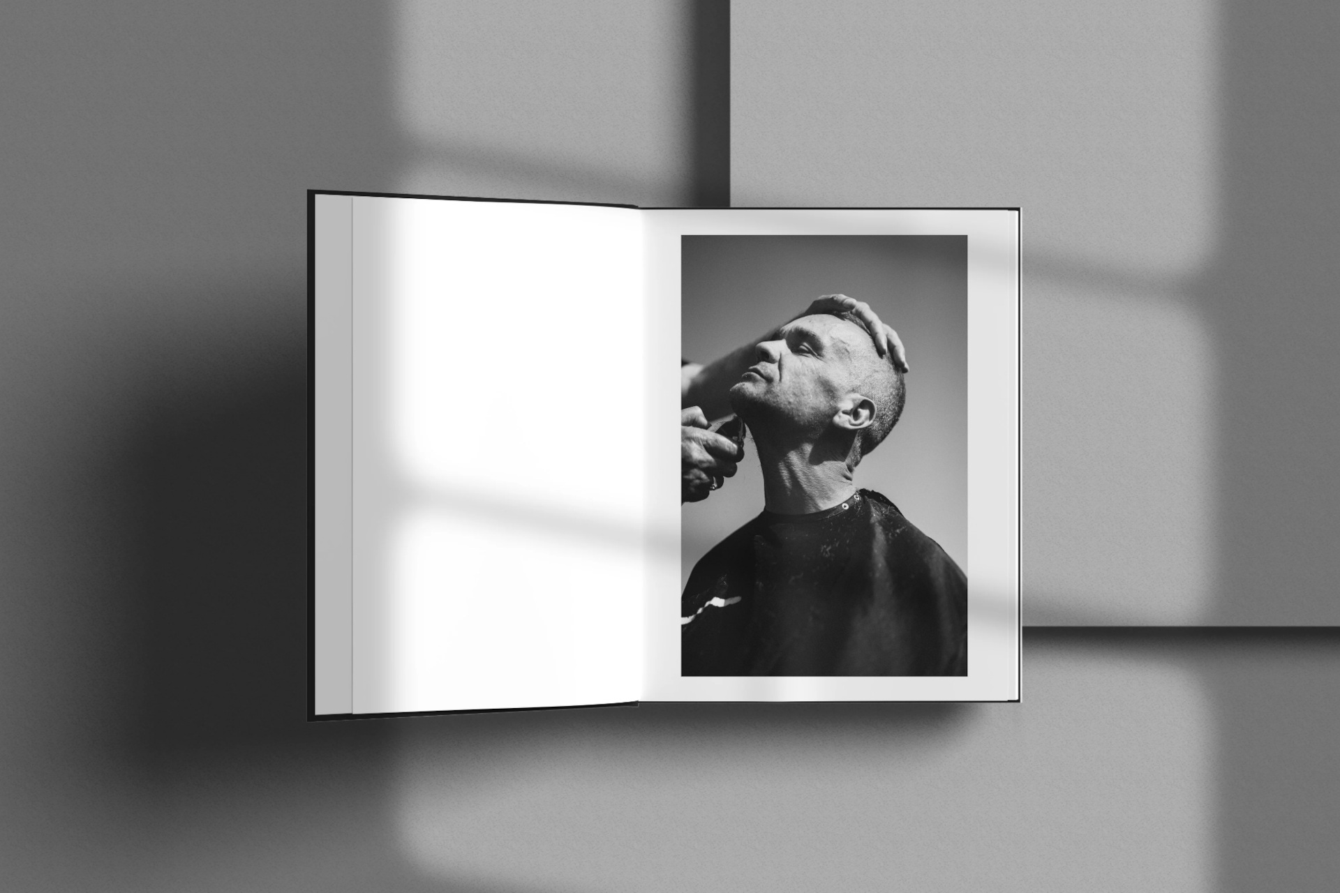 Open book with phot of someone receiving a haircut