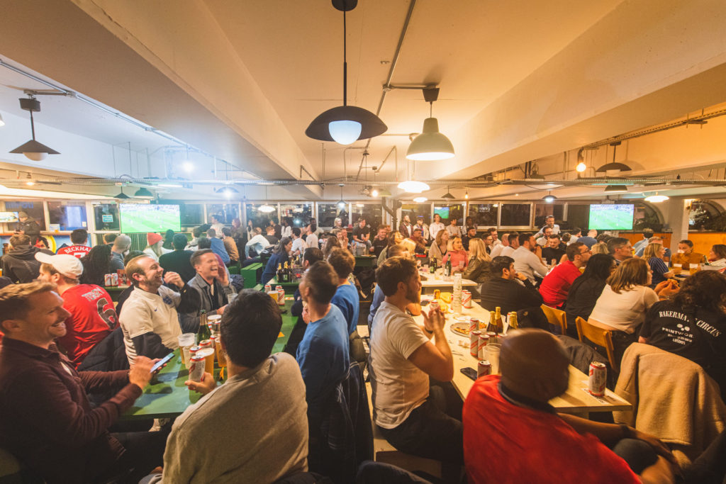People watching football at Peckham Levels