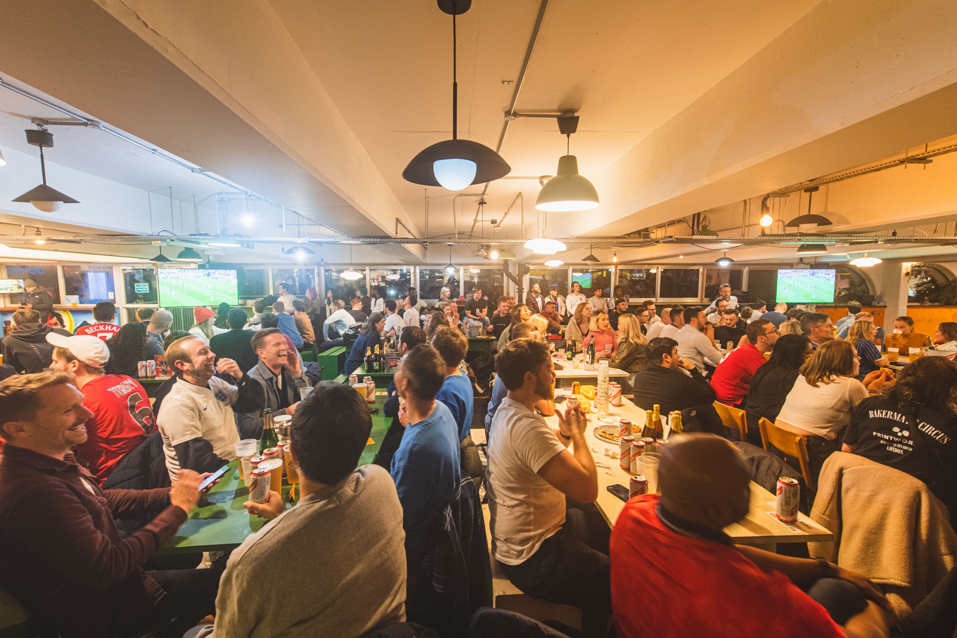 People watching football at Peckham Levels