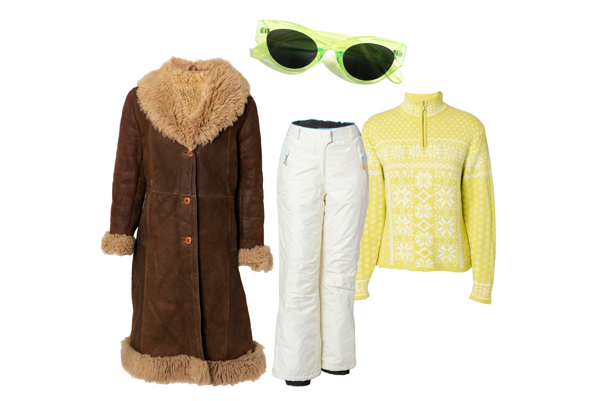 Brown fluffy coat, with yellow jumper, sunglasses and white ski trousers