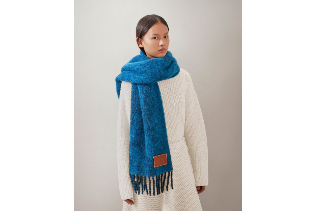 Woman in blue scarf