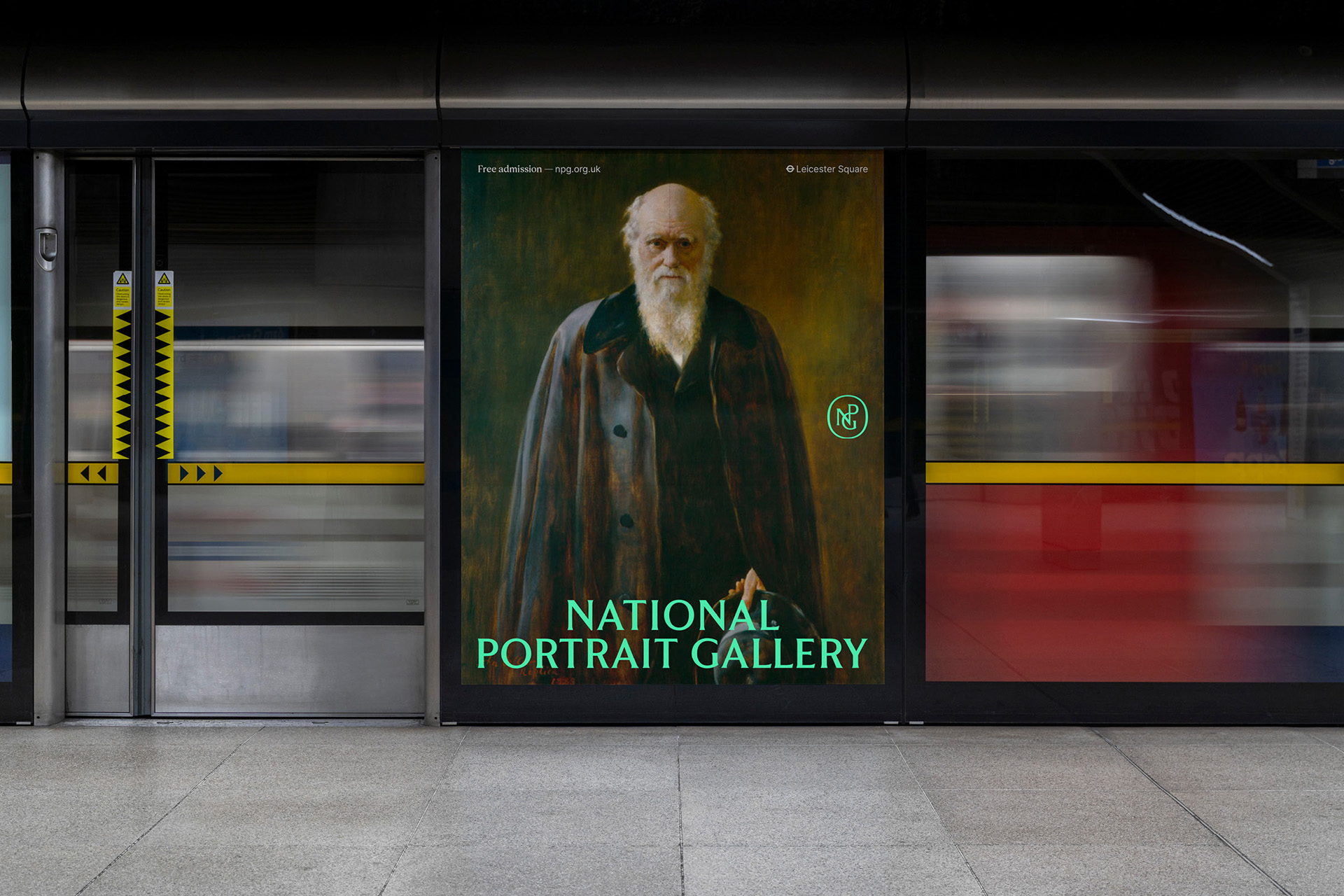 An advert for the National Portrait Gallery as a tube whizzes past