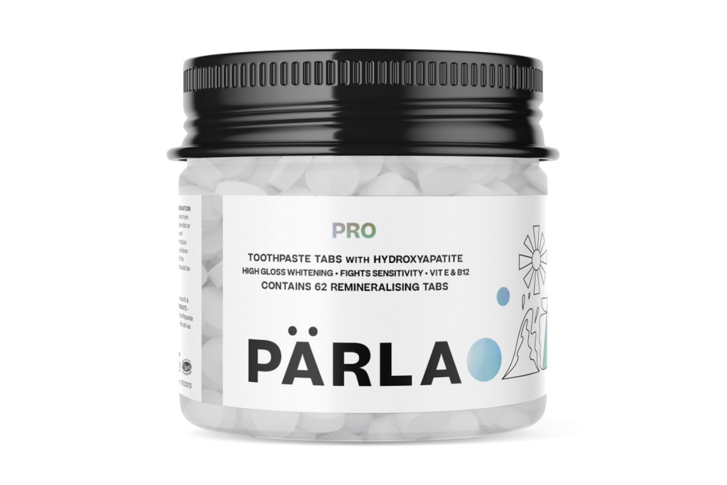Tub of white tabs, with black lid