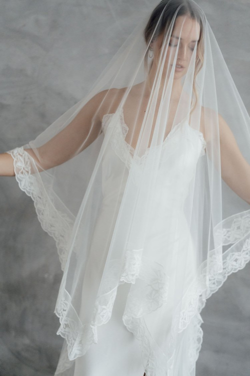 Woman wearing white dress and wedding accessories