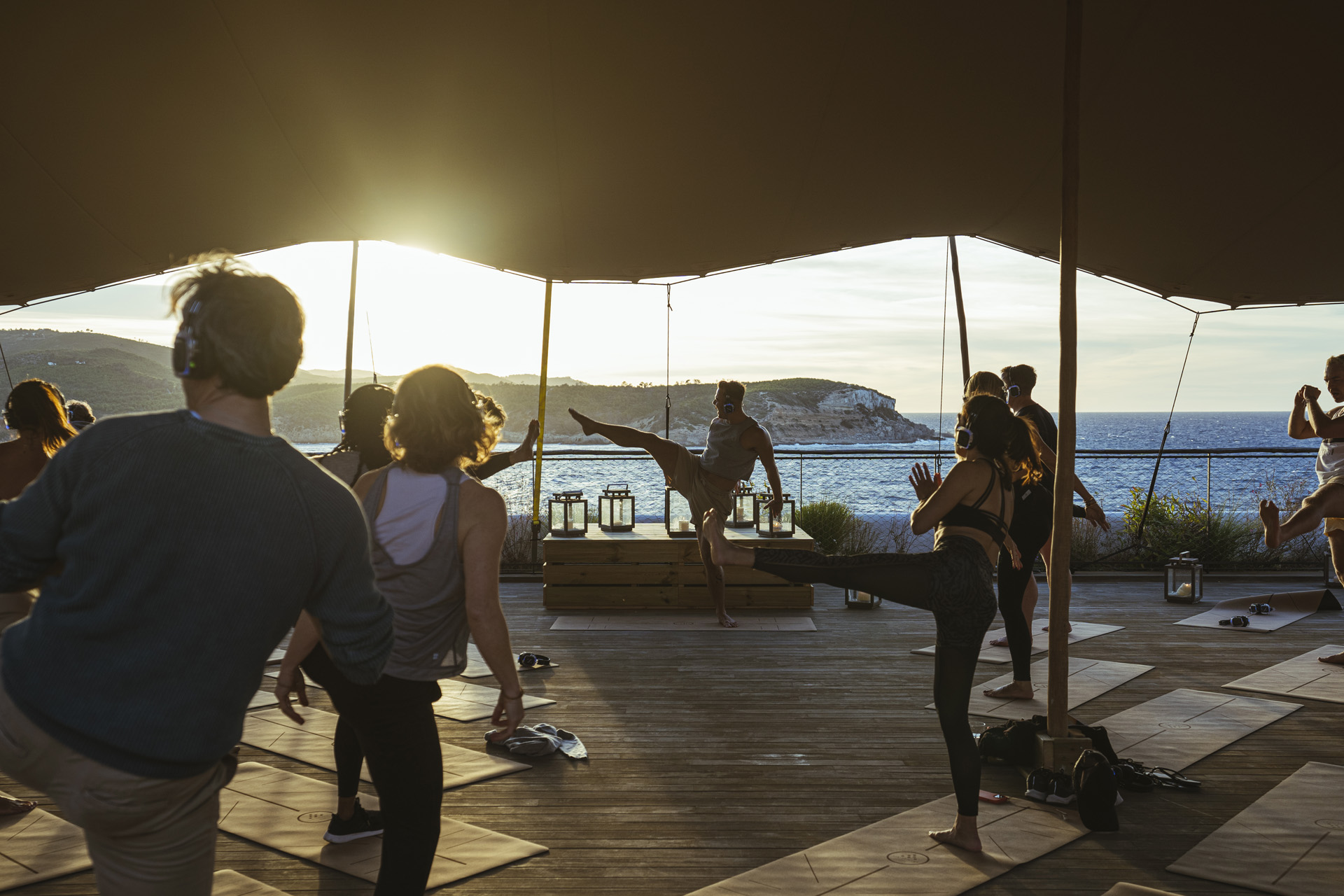 People dancing with headphones at Alma Festival