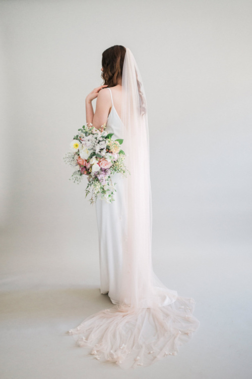 Woman with pink veil