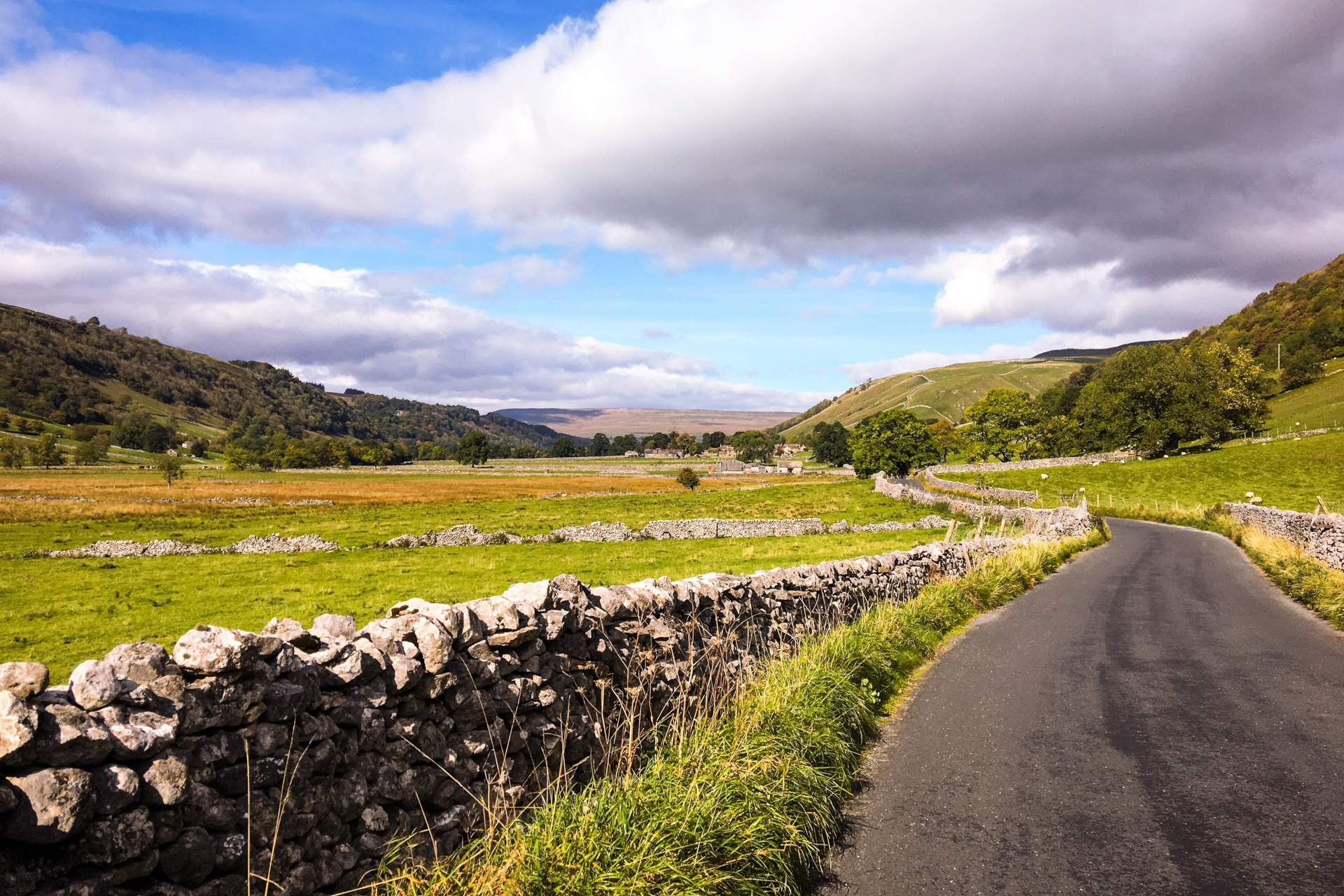 View from road of fields and valleys with stone walls