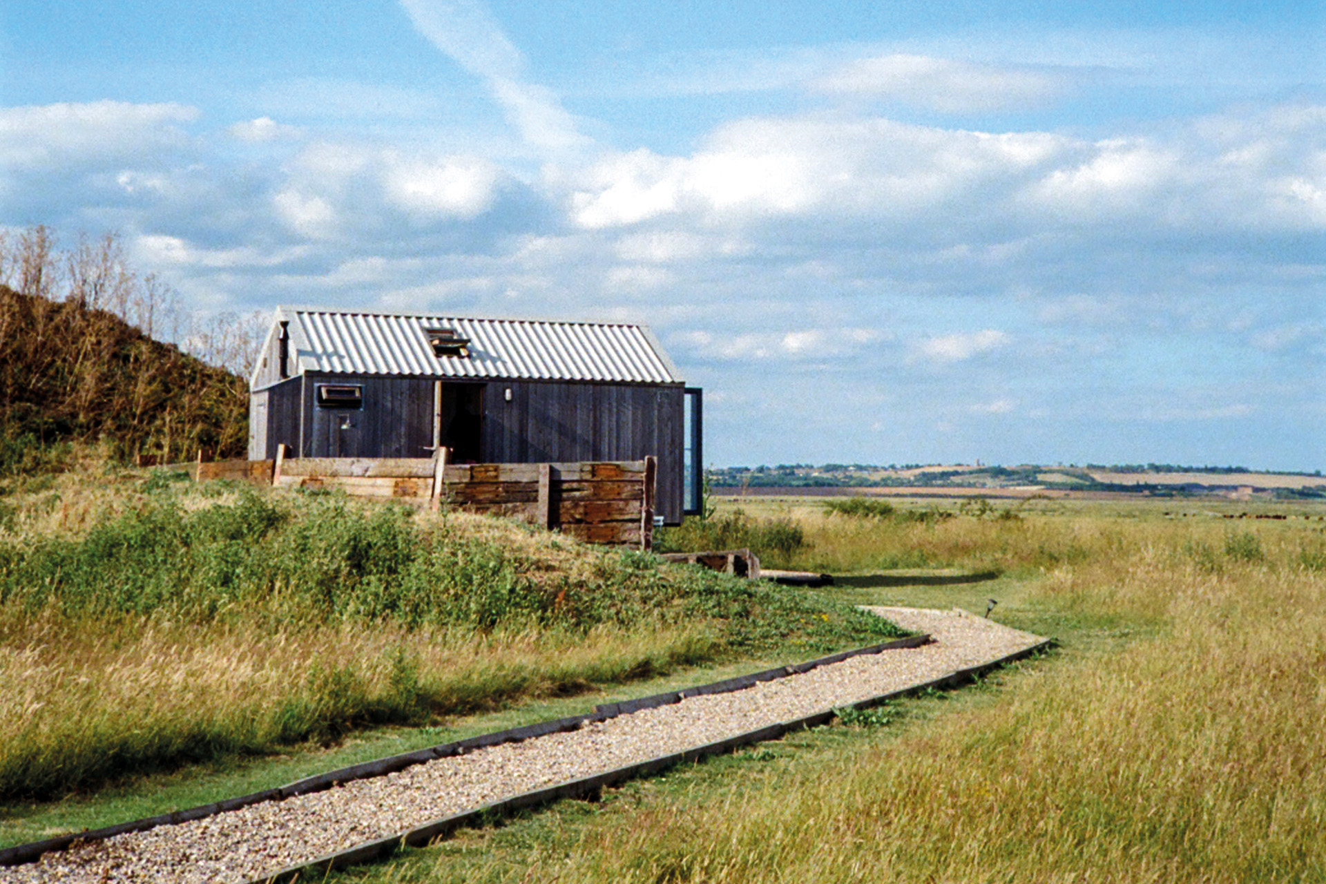 A little barn in a field