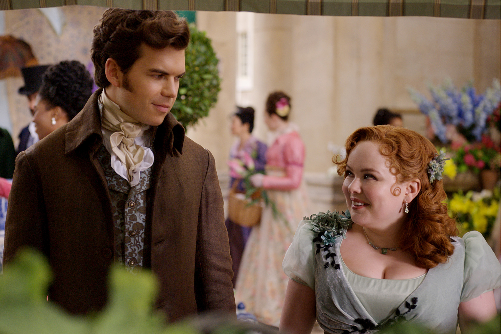 (L to R) Luke Newton as Colin Bridgerton, Nicola Coughlan as Penelope Featherington in episode 10 of Bridgerton