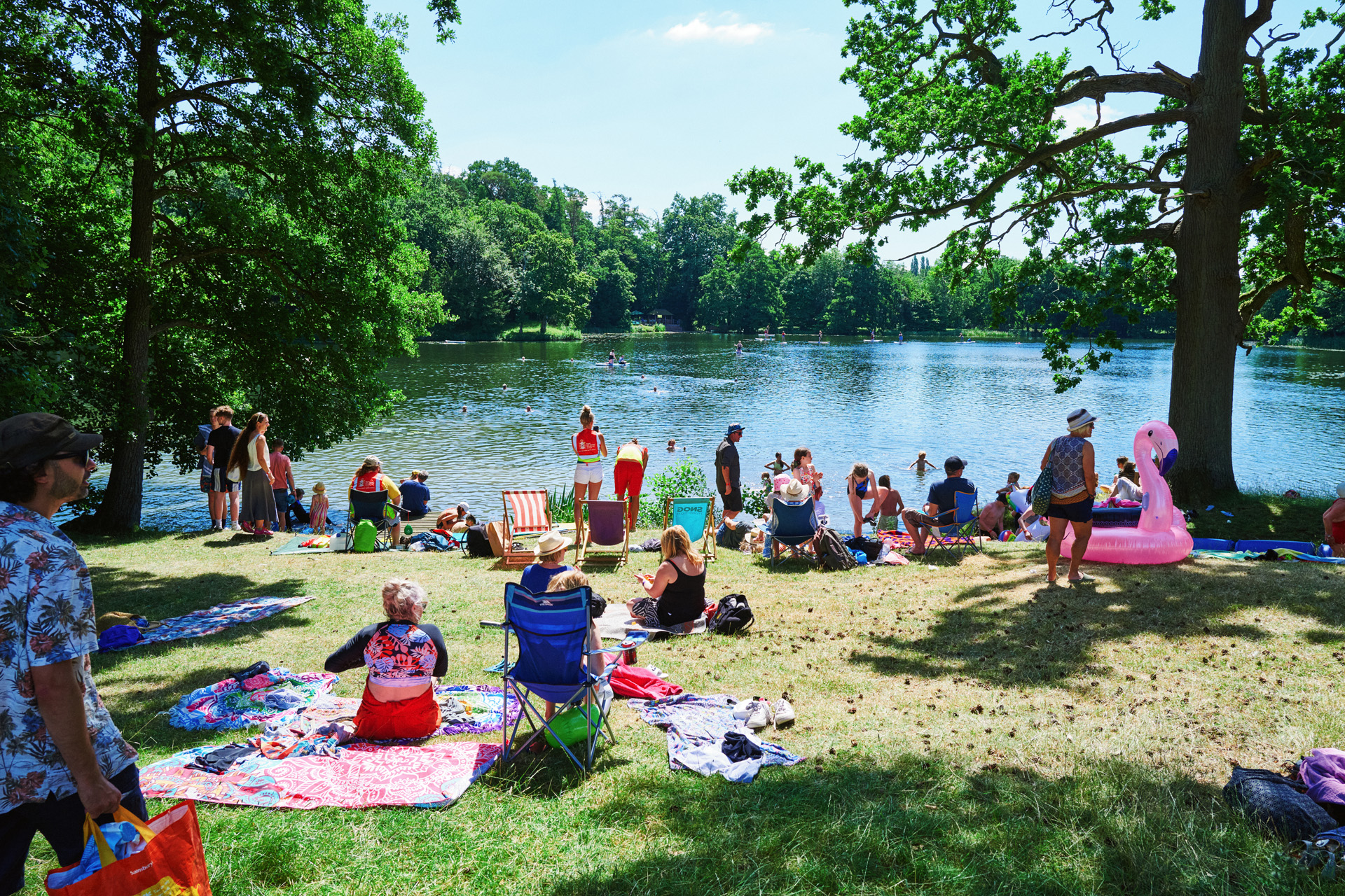 guests lounging by the lakeside at ALSO festival