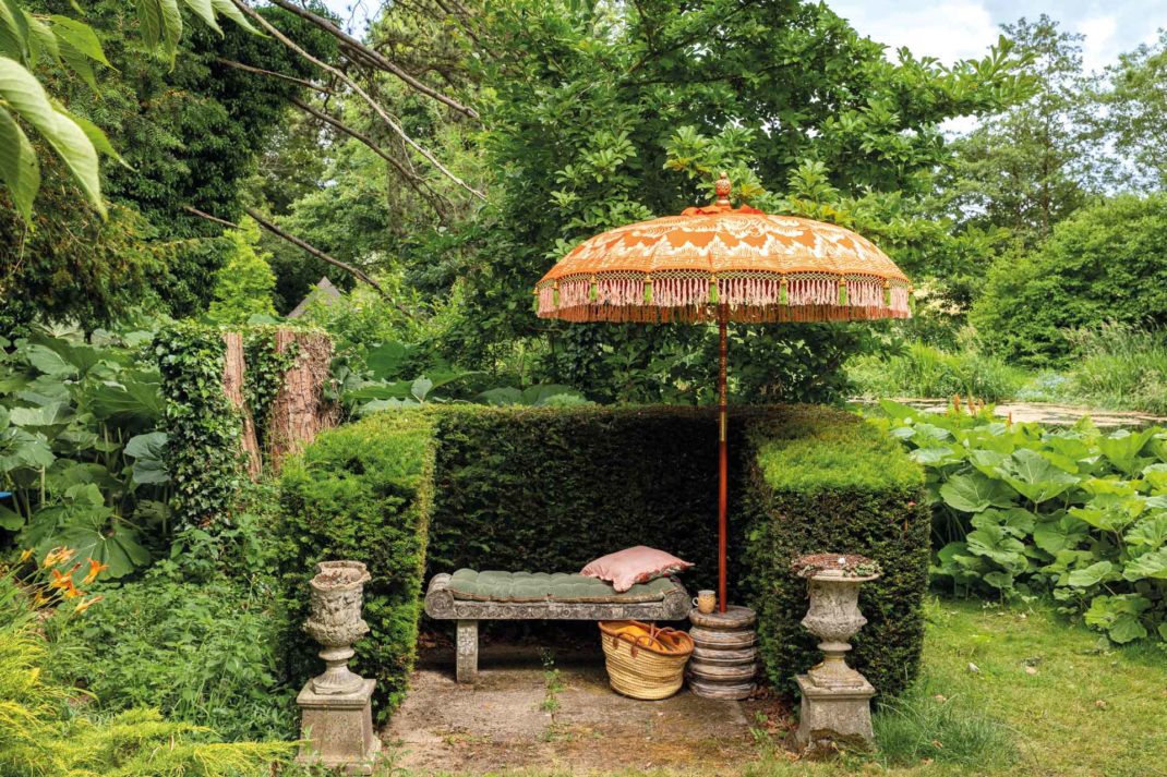 Orange parasol with tassels