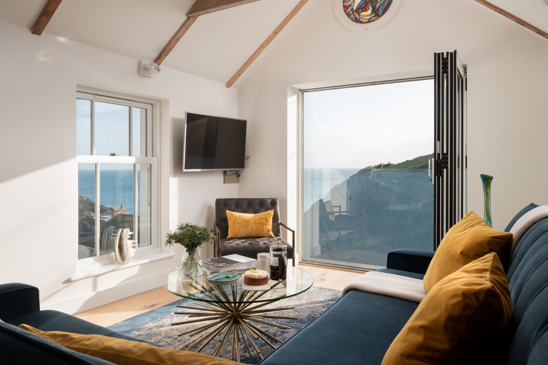 Living room in Cornish townhouse with sea views.