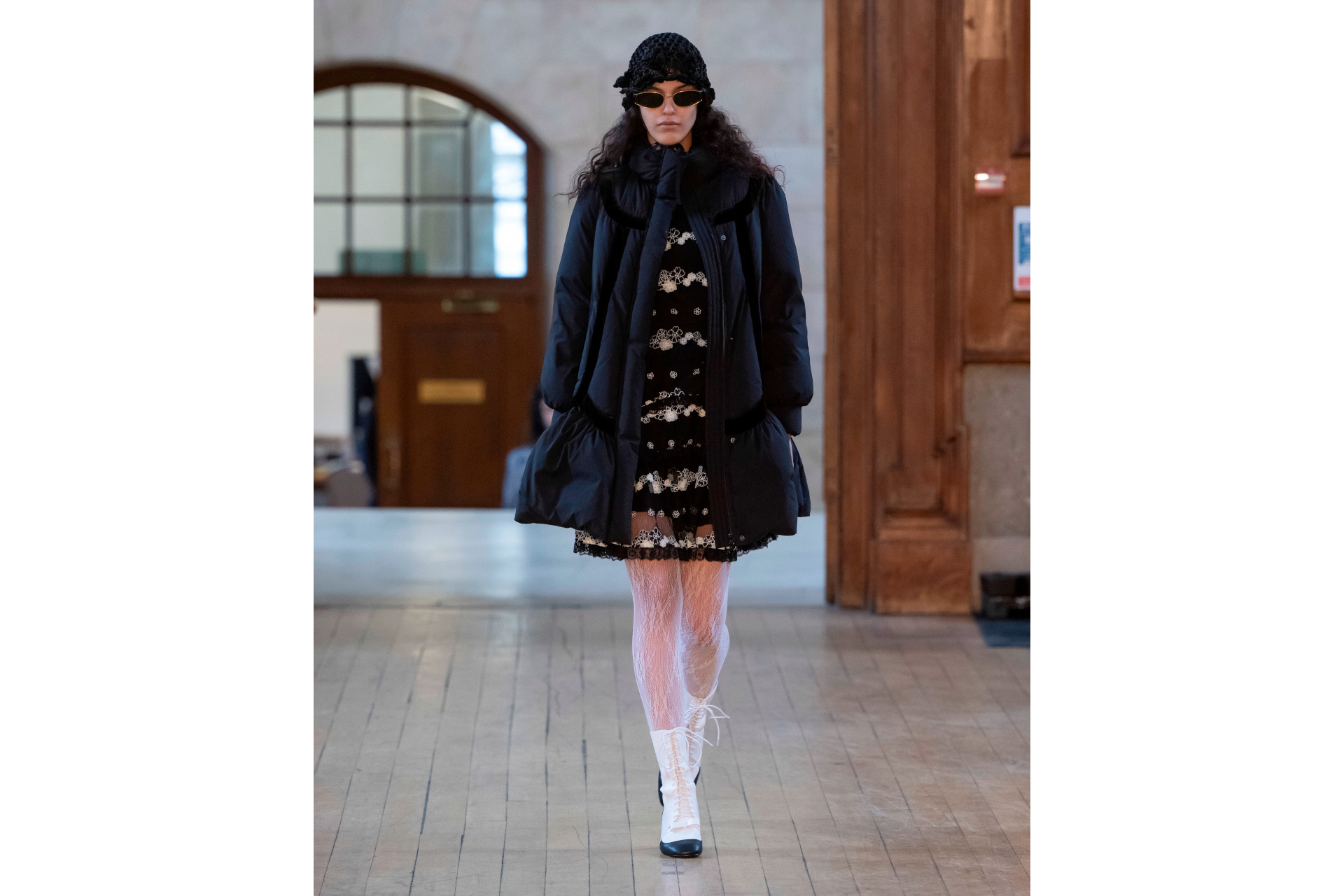 Woman in black coat