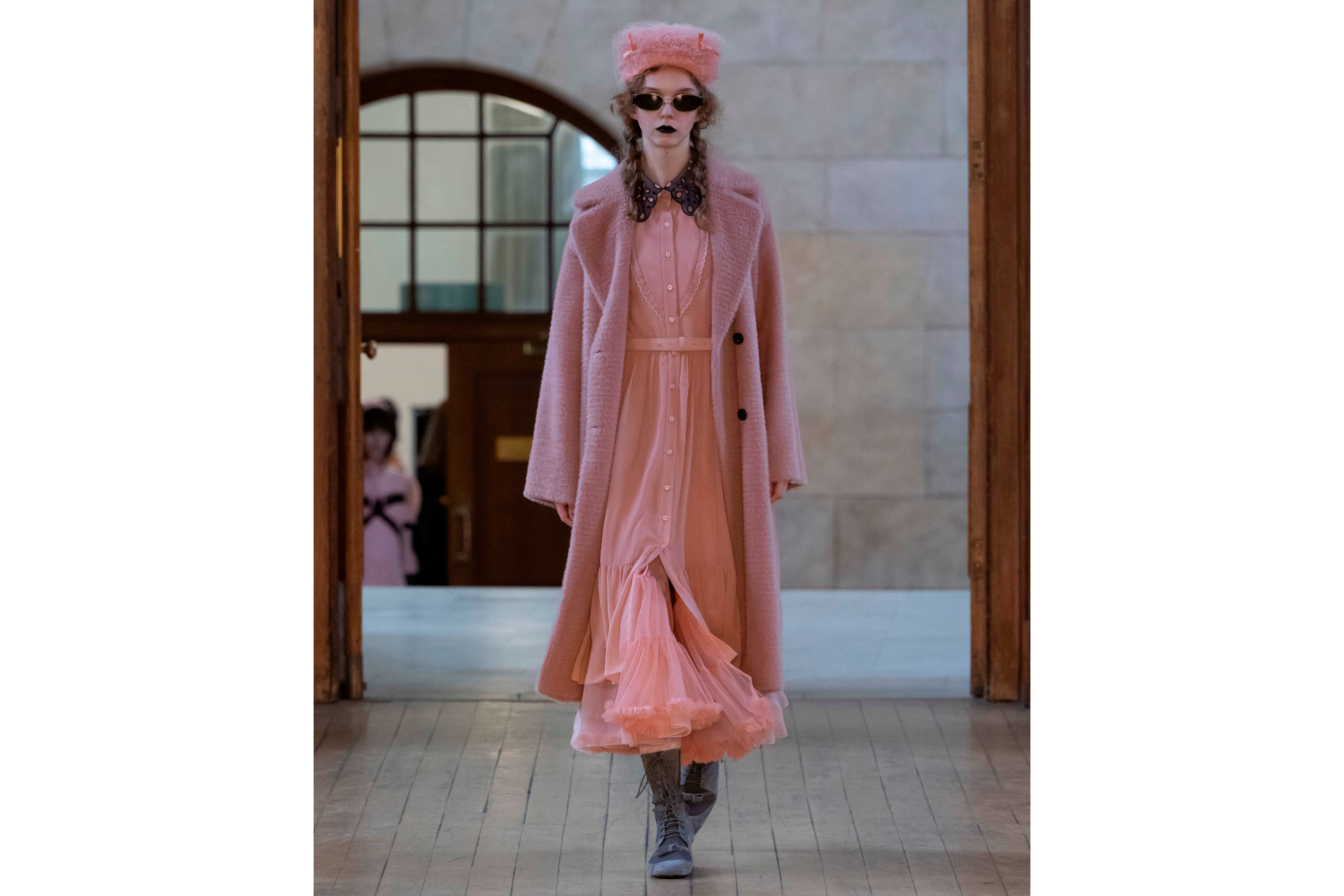 Woman in pink outfit