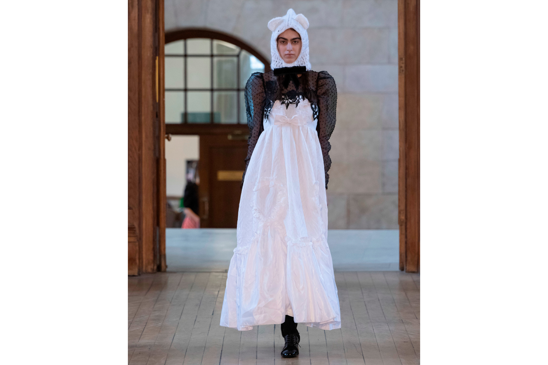 Woman in black and white dress
